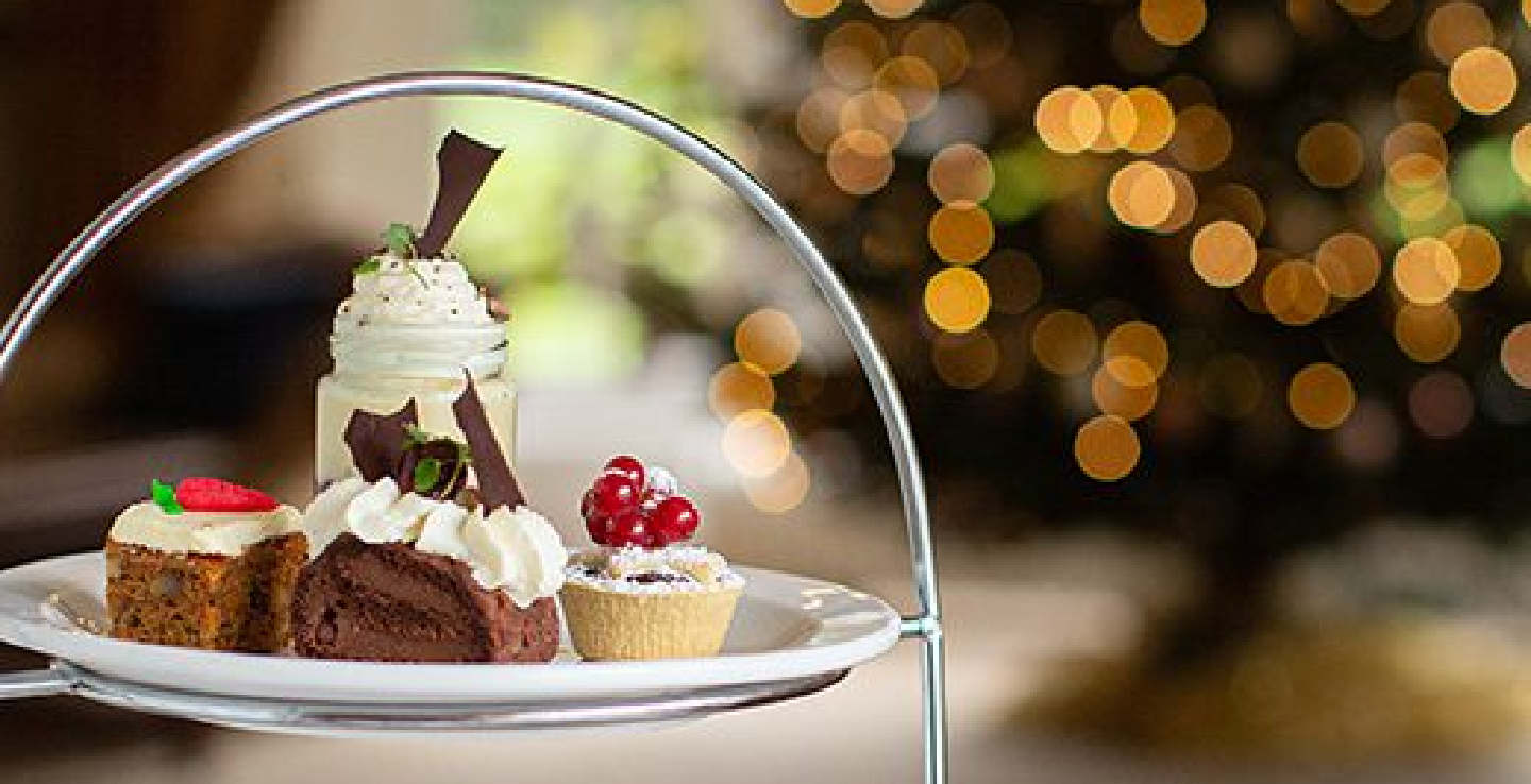 Christmas holiday ideas Christmas afternoon tea with lights in the background